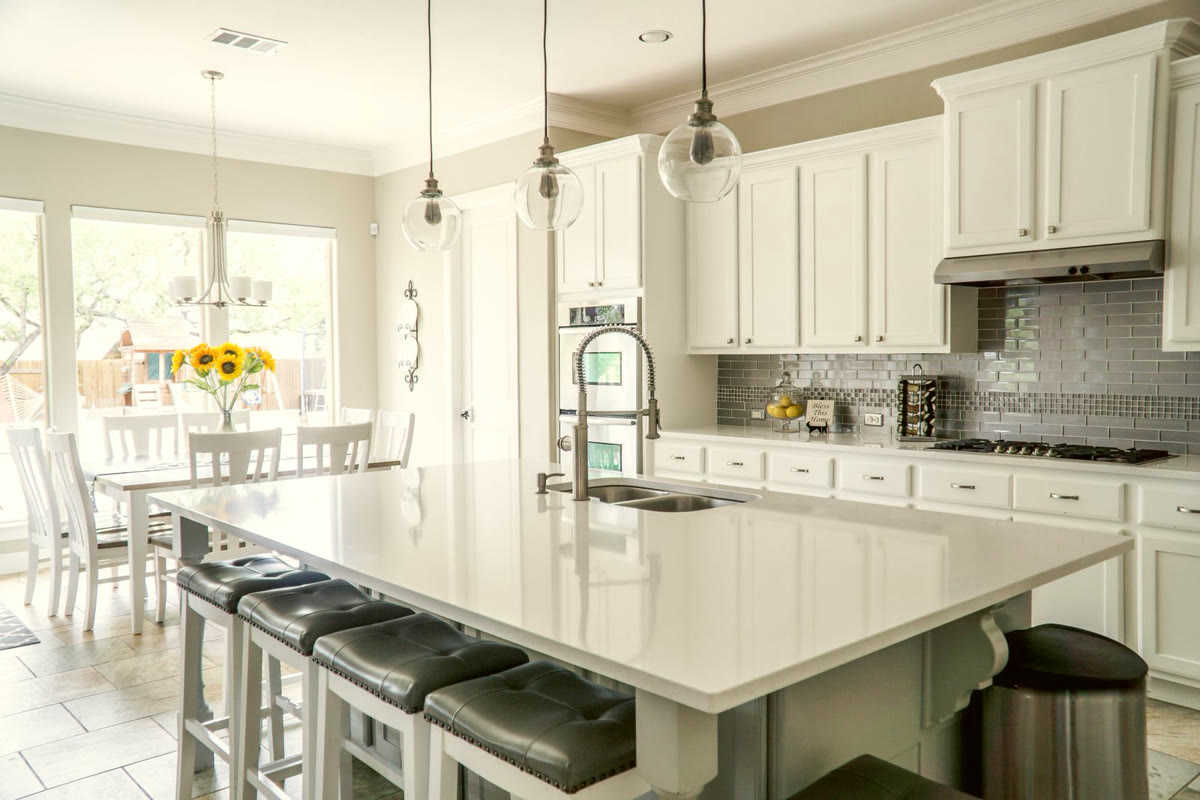 A spotless kitchen counter in warm morning light after a deep clean